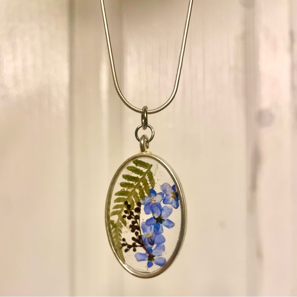 Silver Necklace with Blue Forget me not flowers and fern leaf preserved in resin